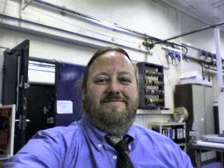 Me in blue shirt and tie