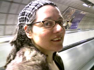 Aleemah on the travolator at Waterloo station