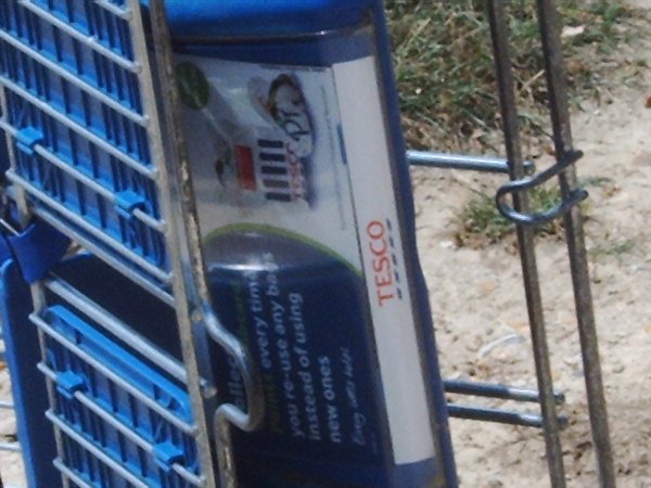close up on shopping trolley logo