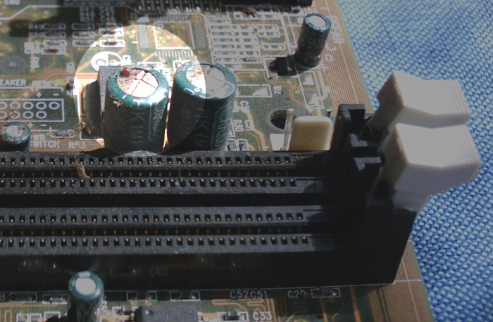 Blown capacitors on MS6147 motherboard