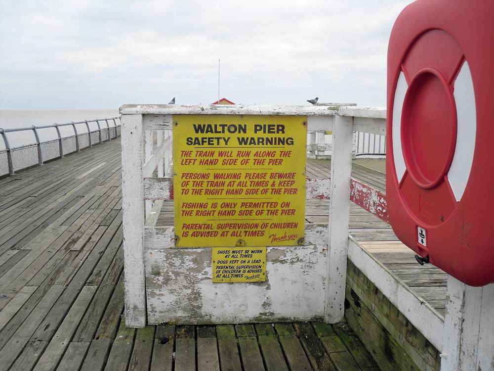 Pier train and general warning notice