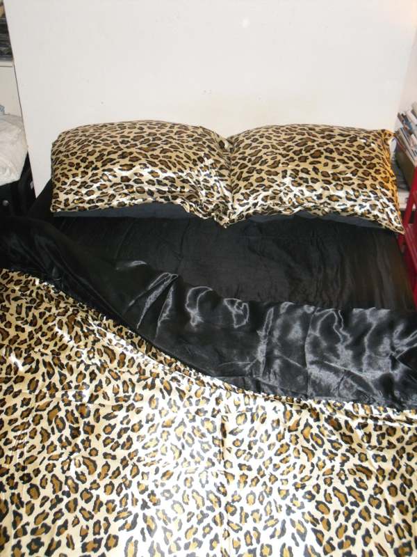 Leopard skin print satin duvet and black satin sheet