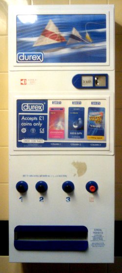 A condom machine in a pub toilet