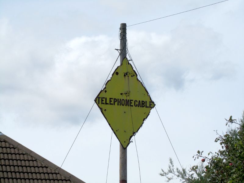 telephone cable sign