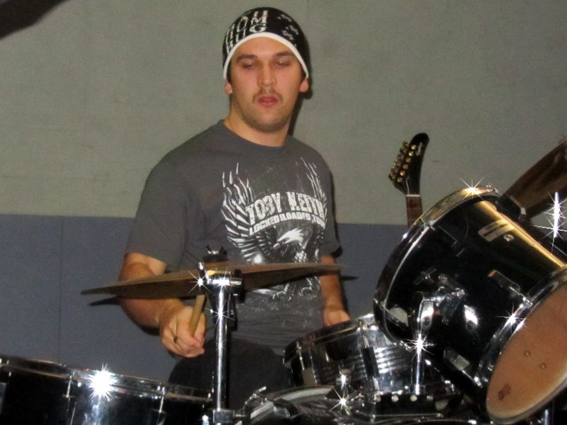Matt Sharp playing the drums for Chain