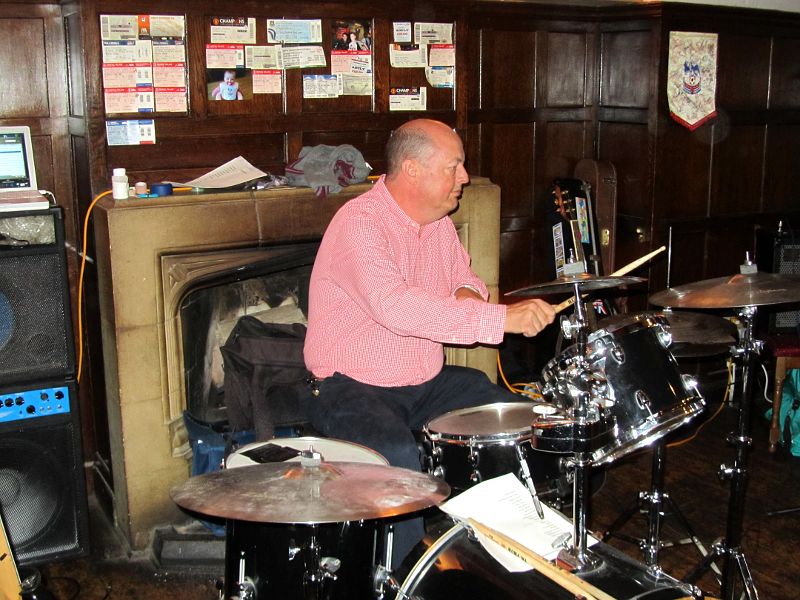 the govenor of The White Swan, West Wickham, tries his hand at drumming