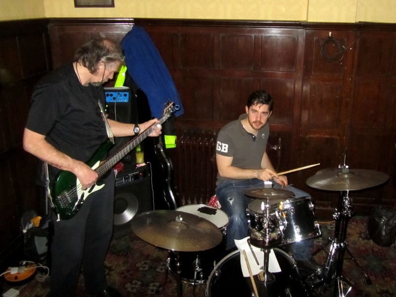 Ravi on bass, and Guy Harris on drums