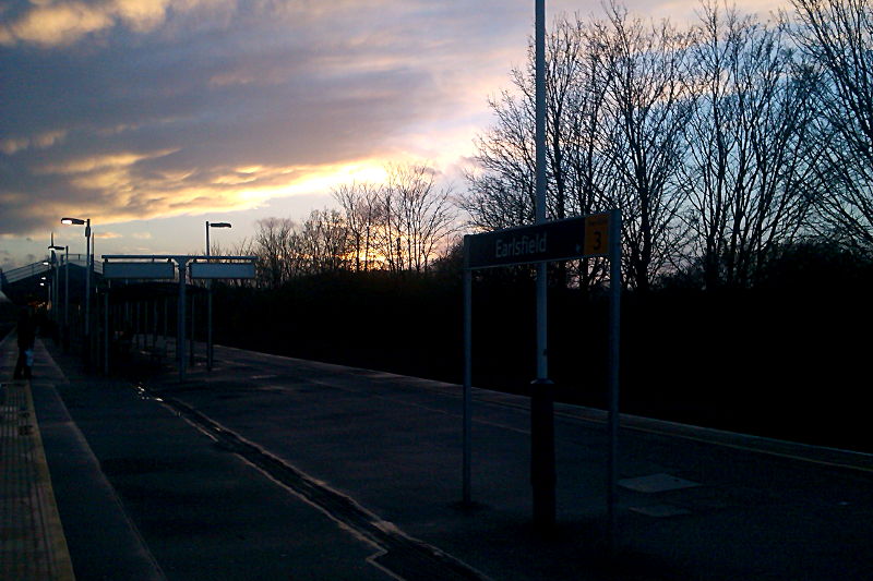 the setting sun at Earlsfield station