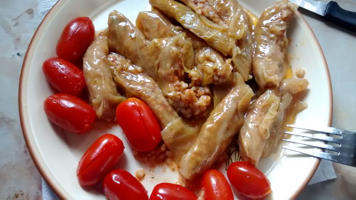 stuffed cabbage leaves and tomatoes