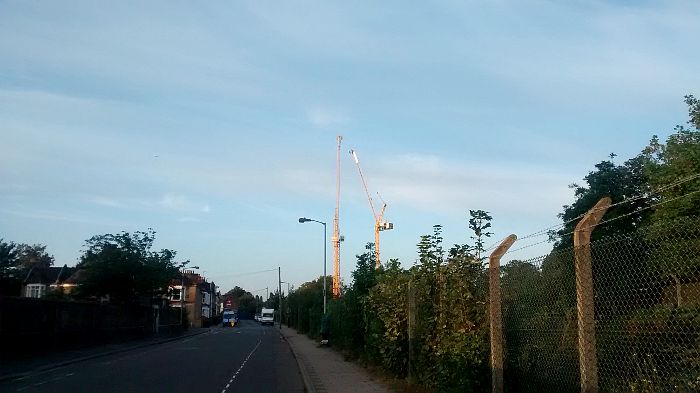 two cranes and blue sky