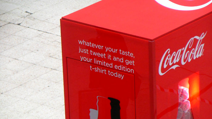 tweet your Cocal Cola message and win
                          a t-shirt