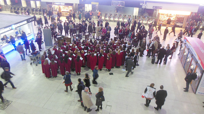 choir/carol singers at
                    Waterloo station