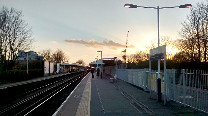 the sun starting to
                          set at Earlsfield station.