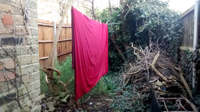 duvet cover drying
                          in the garden