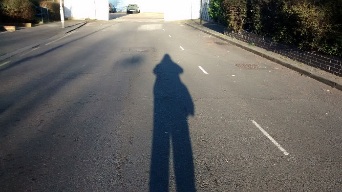 My shadow as I
                          approached work this April morning