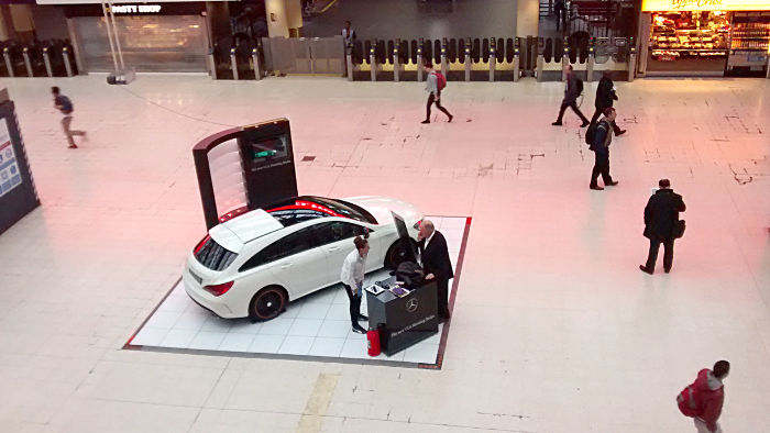 Mercedes Benz on
                            the concourse of Waterloo station