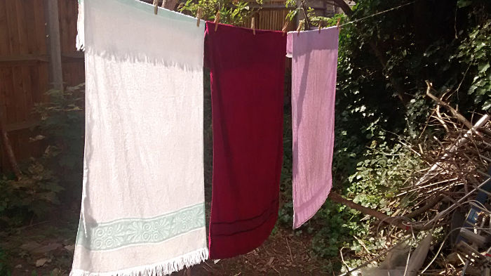 three towels drying
                          on the washing line