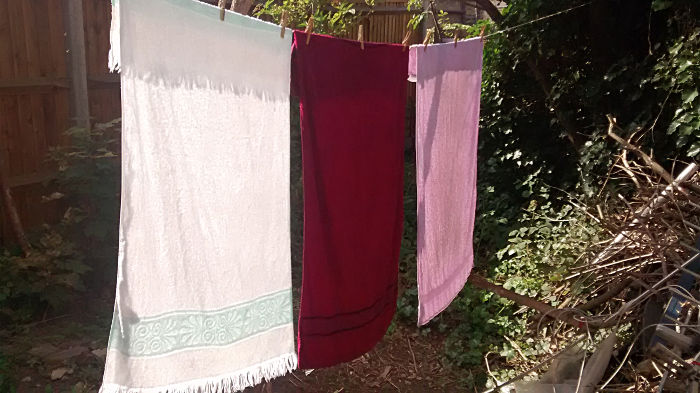 three towels drying
                          on the washing line