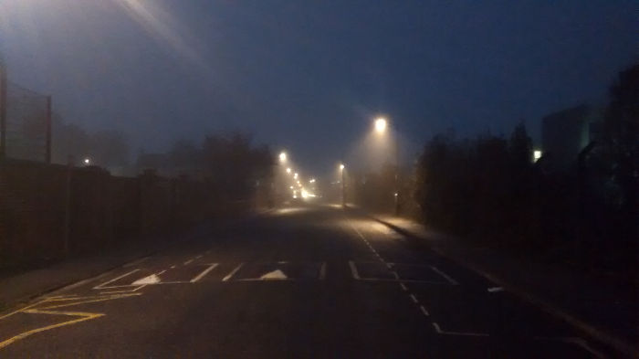 streetlamps in the fog