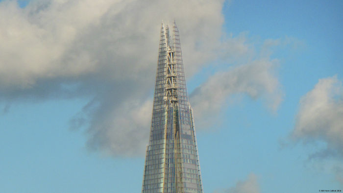 The Shard
                              looking "futuristic" in fron of
                              a cloudy blue sky