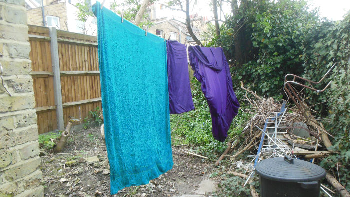towel and sheets
                          drying on the washing line