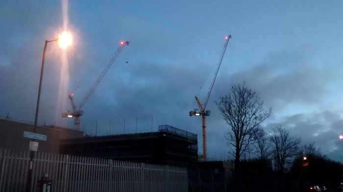 red lights on
                              the cranes this morning