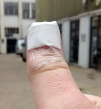 my damaged thumb in sticking plaster