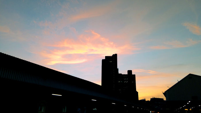 pink, orange, and red
                      clouds at sunset viewed from platform A at
                      Waterloo East station