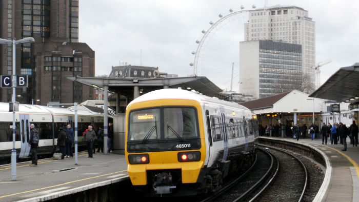 class 465 train in platform B of
                            Waterloo East station with the London Eye in
                            the background