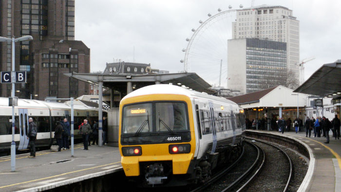 class 465 train in platform B of
                            Waterloo East station with the London Eye in
                            the background