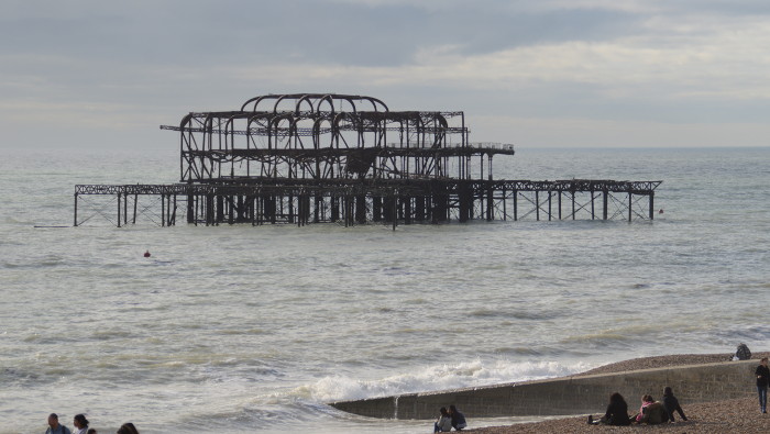 the burnt remains of the west pier at
                        Brighton