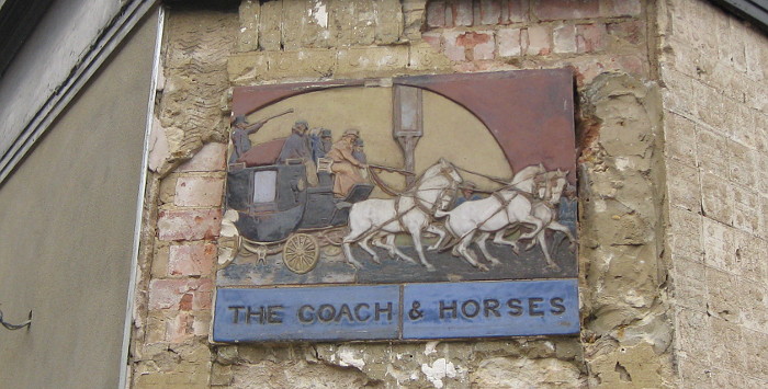 old tiles showing the
                        old name of a pub