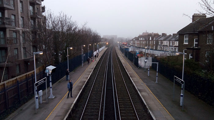 Looking north from Catford Bridge station to a
                  misty horizon