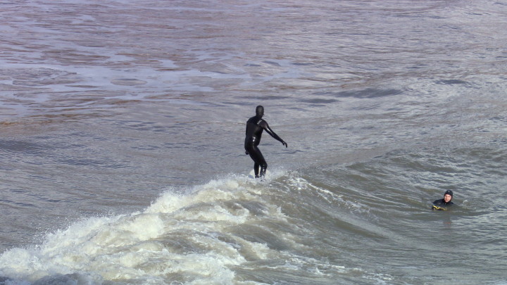 black
          rubber encased surfers