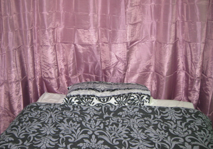 light purple, silky
                        looking curtains
