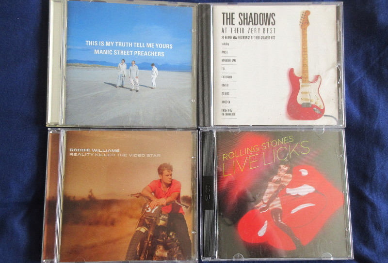 4 CDs bought in a
                      charity shop for 99p each