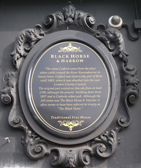 plaque outside the pub that acknowledges
                    it's original name