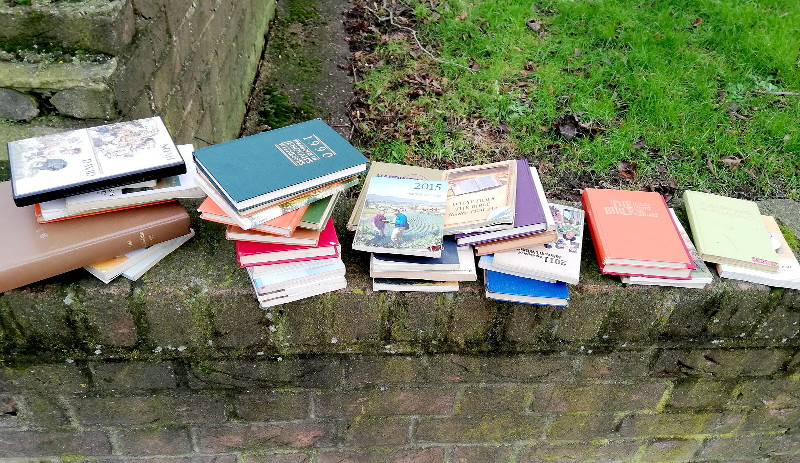 discarded
                              religious books and video
