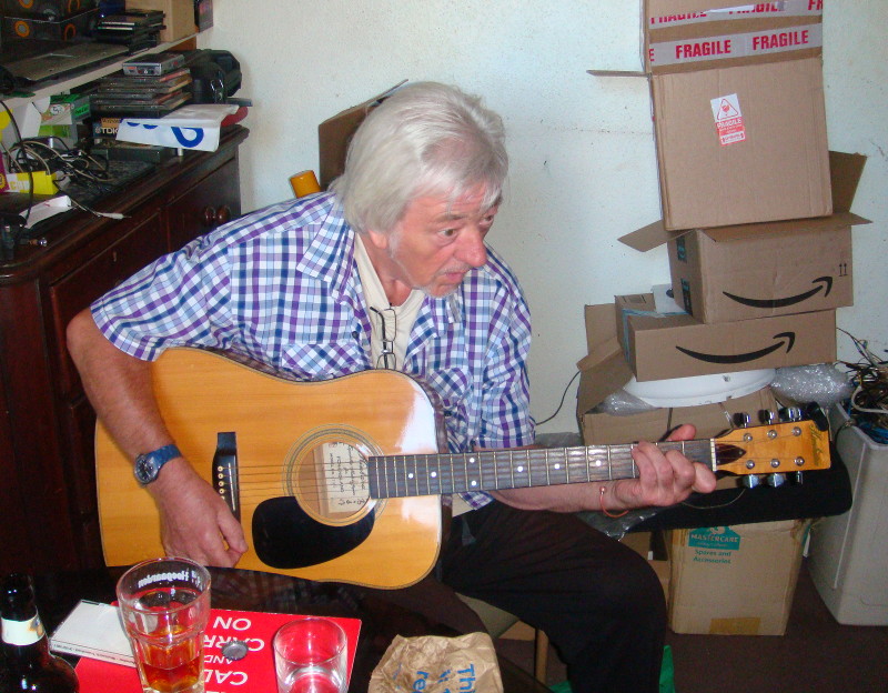 Michael with
                              guitar