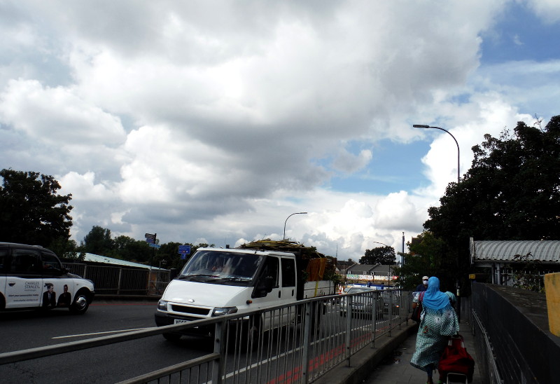 cloudy view while walking over
                              Catford Bridge