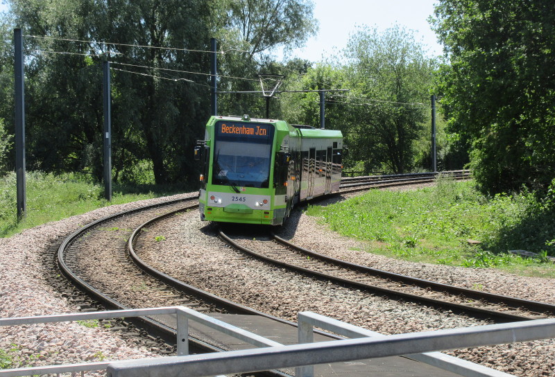 Tram coming
                                  around the curve towards the cemetery
                                  gates