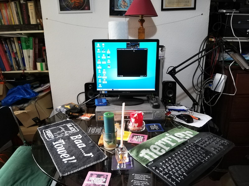 dining
                                      room table cluttered with PC and
                                      VHS machine