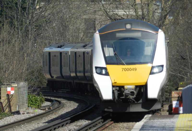 Class 700 train
                            approaches Catford