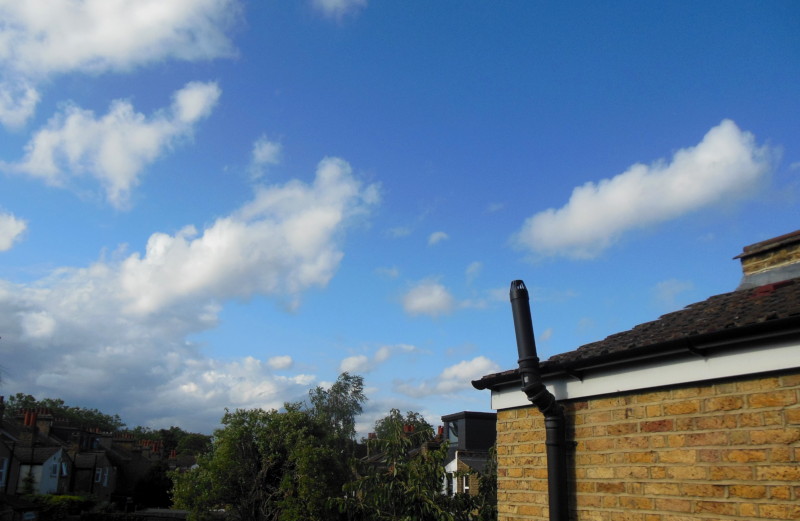 blue sky and
                                  fluffy clouds