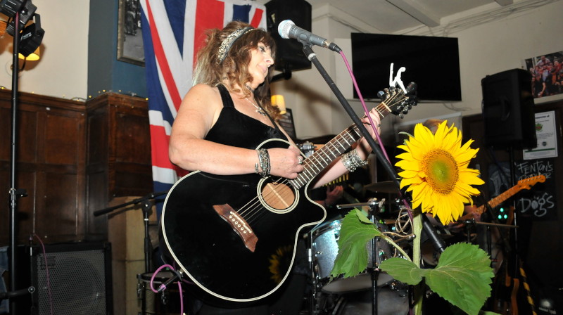 Jo and her
                                  pet sunflower