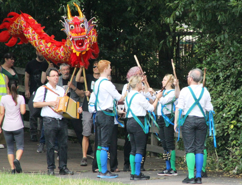 Chinese
                                  dragon and morris dancers