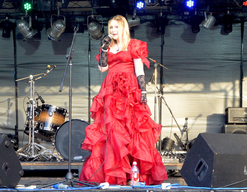 Lilise in bright
                                                red dress