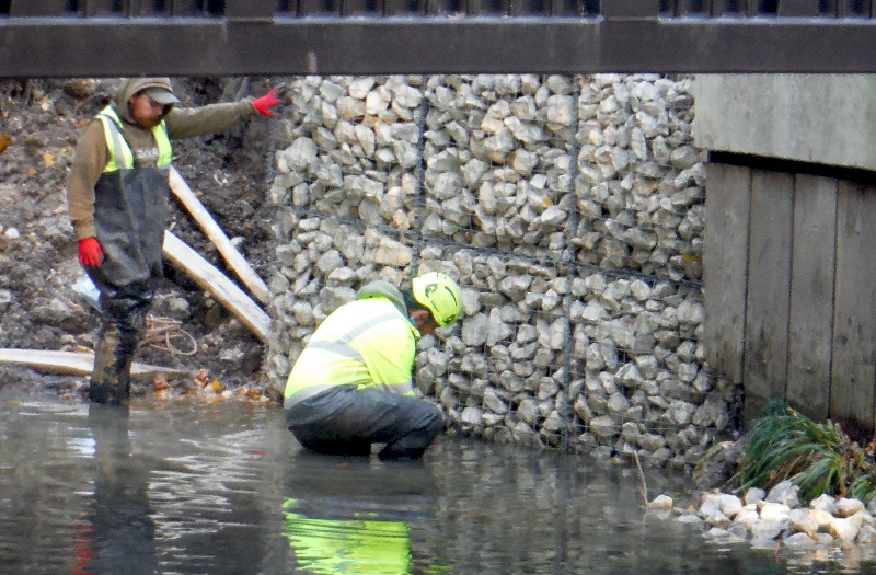 workmen
                                      adjusting something