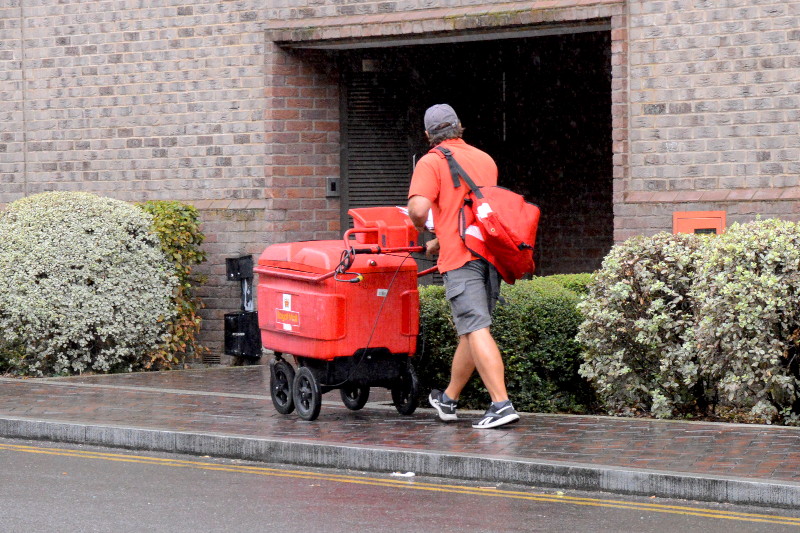 postman
                                      in the rain