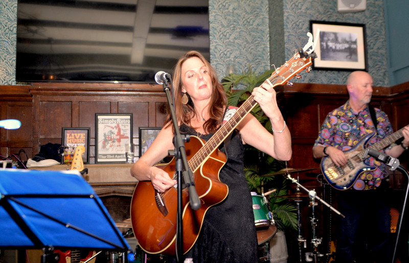 Miranda
                                      and some flamboyant guitar
                                      playing